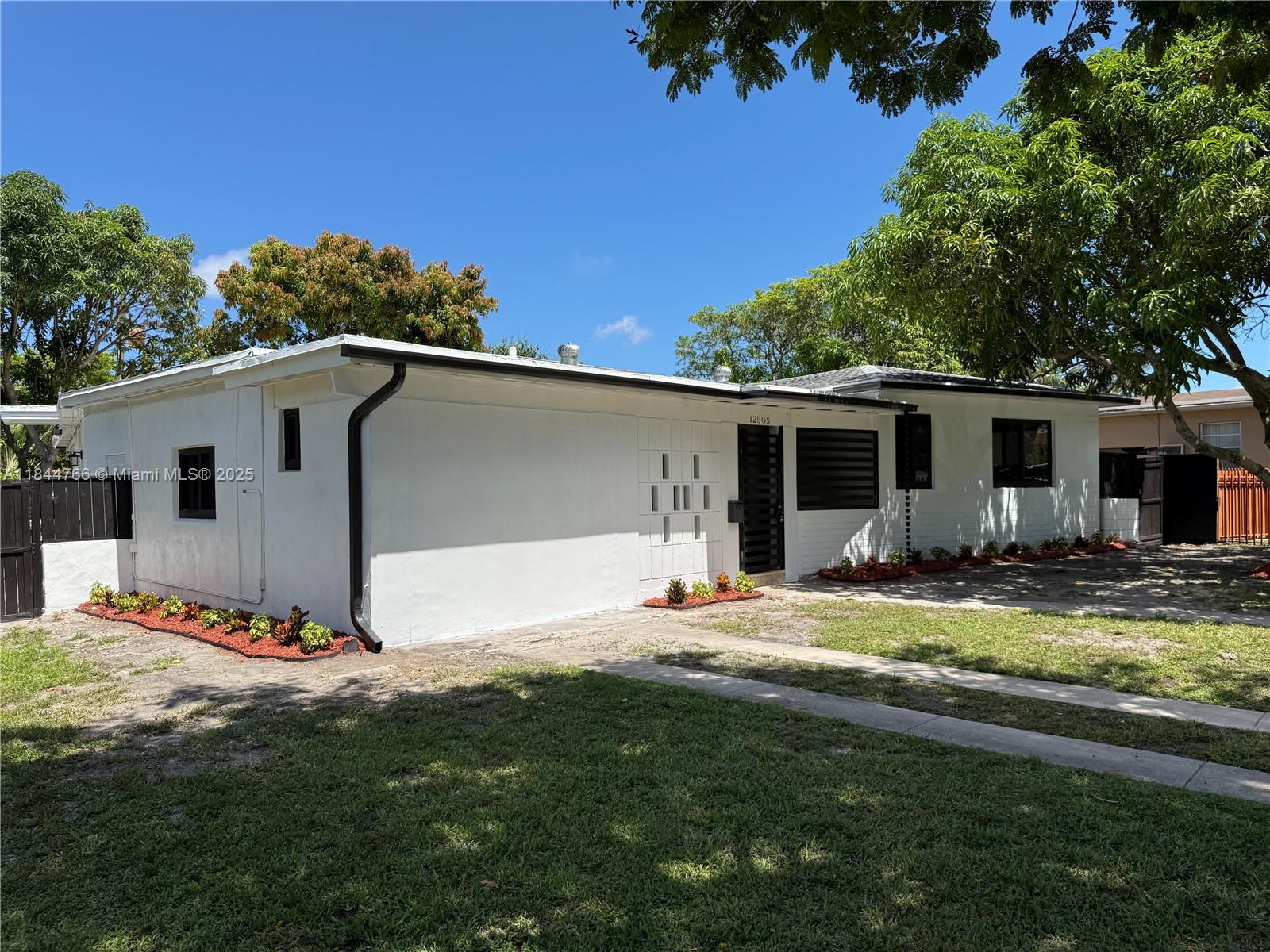 Fully remodeled in 2025 with a 2019 roof, this stunning North Miami home offers 3 fully renovated bathrooms, luxury vinyl floors, (anti-scratch and water proof), new lighting, impact windows, and French doors. The pool features a new heater, pool plaster finish, jets, lights, and full equipment. Includes a private sauna and a fully permitted guest suite with its own bathroom—perfect for guests or rental potential. Enjoy lush landscaping, rain gutters, a wide driveway with ample parking, and fruit trees (3 mango trees and 1 avocado). Termite-treated with a 1-year warranty. Located in a prime, central area near Downtown, beaches, restaurants, and major highways. A truly move-in ready home with style, comfort, and functionality—don’t miss.