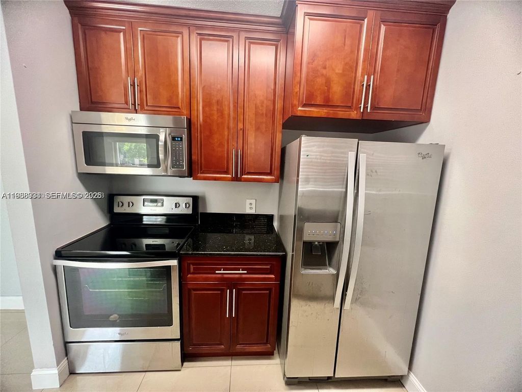 Photo of 660 Cypress Club Way #G11, Deerfield Beach, FL 33064 (MLS # A11988934)