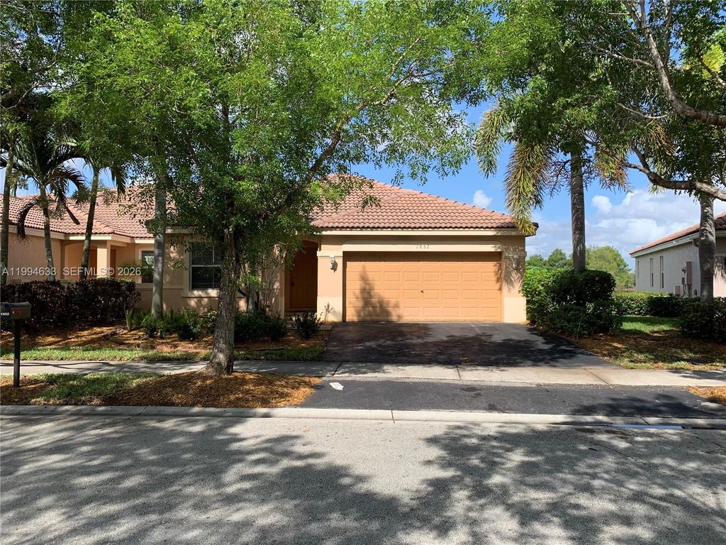 Photo of 1852 Andromeda Ln, Weston, FL 33327 (MLS # A11994633)
