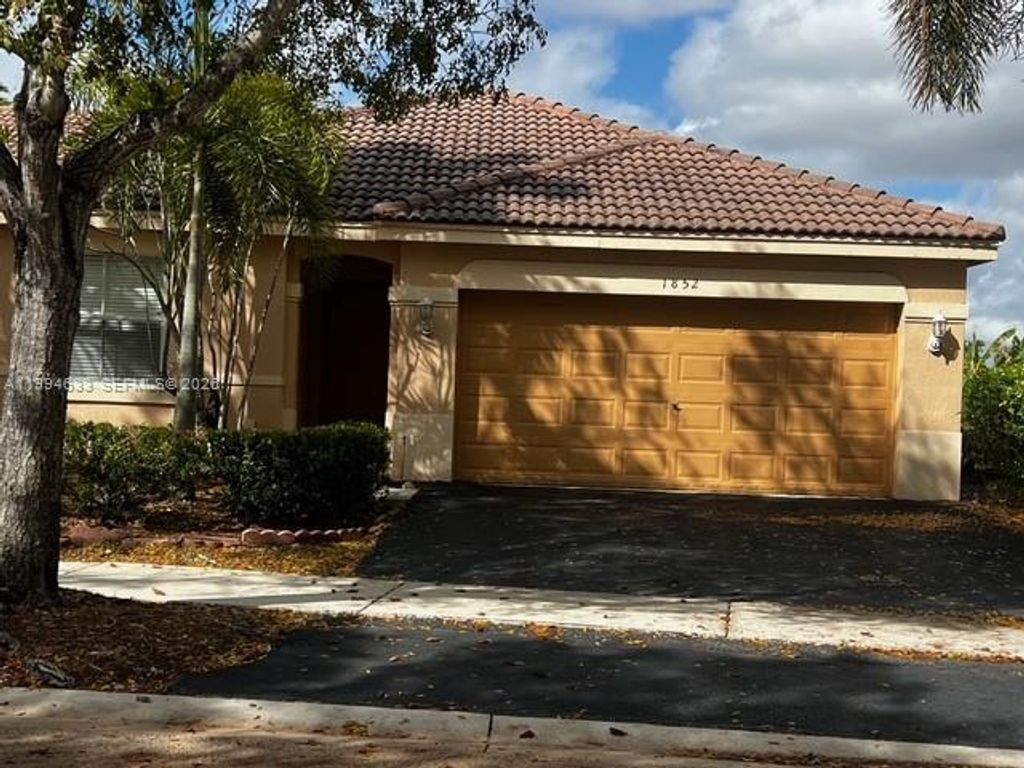 Photo of 1852 Andromeda Ln, Weston, FL 33327 (MLS # A11994633)