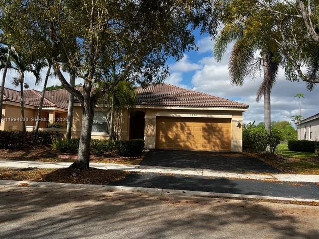 Photo of 1852 Andromeda Ln, Weston, FL 33327 (MLS # A11994633)