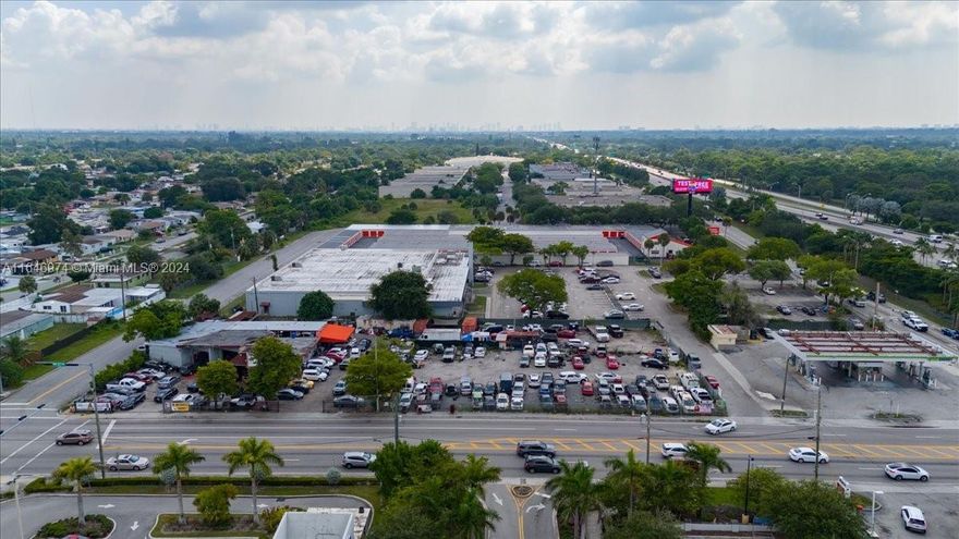 Current use is automotive repair and sales. As per owner, property is approved for low-income housing up to 84 units. Current zoning is BU13 (Business Use). Square feet provided includes lot next door (to south). Sale includes two folio's. Excellent opportunity for owner-developer. Property is zoned for PCD – Planned Corridor Development.