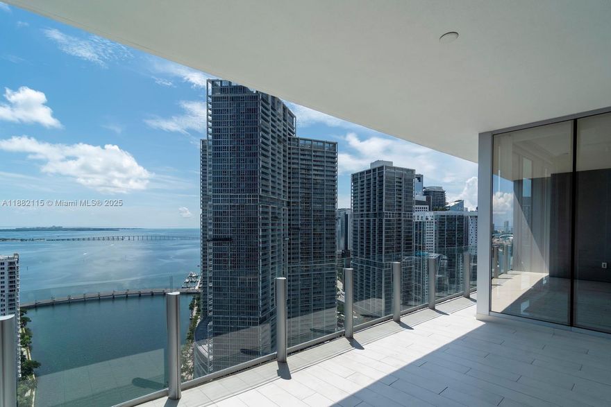 At Aston Martin Residences, Unit 3503 delivers the perfect blend of prestige and lifestyle. This 3-bedroom plus den, 4.5-bath residence includes a family room and staff quarters, all finished with white marble floors, Artefacto furnishings, and Ornare closets. Expansive windows capture stunning views of the Miami River and Brickell Key, while the chef’s kitchen with top-tier appliances enhances its appeal. With 42,000 sq ft of amenities—sky-high pool, luxury spa, fitness center, private theaters—this building is a destination in itself. Located in Downtown Miami, it offers unbeatable value for clients seeking luxury and exclusivity.