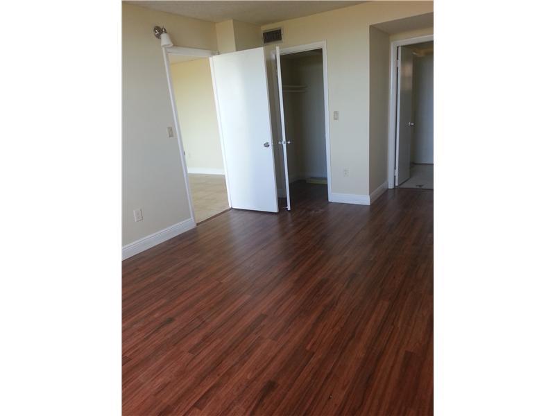Spacious one bedroom, one bath, fifth floor condo 840 square feet, with a balcony. Large mirrored living room wall. Their are two closets in the bedroom, one is a walk in closet. Completely redont, brand new kitchen and bathroom. Assigned parking space an d plenty of guest for an additional car. Fast move in. This is the one, show and rent!!! Section 8 welcome!!! Easy to show on lock box.