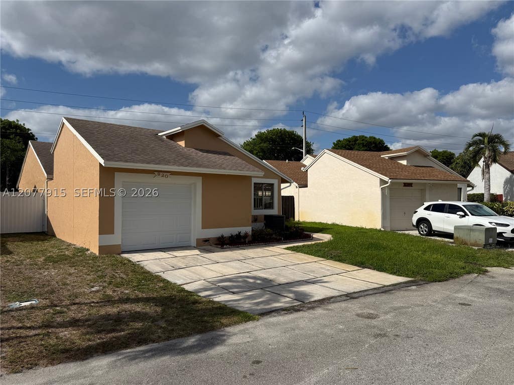 Photo of 920 SW 111th Ave #1, Pembroke Pines, FL 33025 (MLS # A12077915)