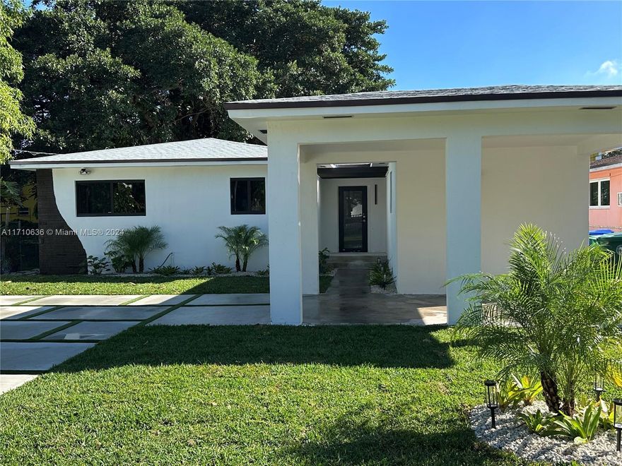 This home has been completely renovated and features a new roof and flooring throughout. It includes high-end finishes in every space, premium stainless steel appliances, and stylish quartz countertops in the modern kitchen, as well as impact-resistant windows and doors. In the bathrooms, elegant design elements and glass shower doors add a contemporary touch. The spacious master suite boasts a walk-in closet and a beautifully designed master bathroom. 
Additionally, the property features a lovely backyard, perfect for enjoying time with friends and family. Ideally located, the home is very close to Wynwood, the Design District, and Midtown. Just bring your belongings and move right in!