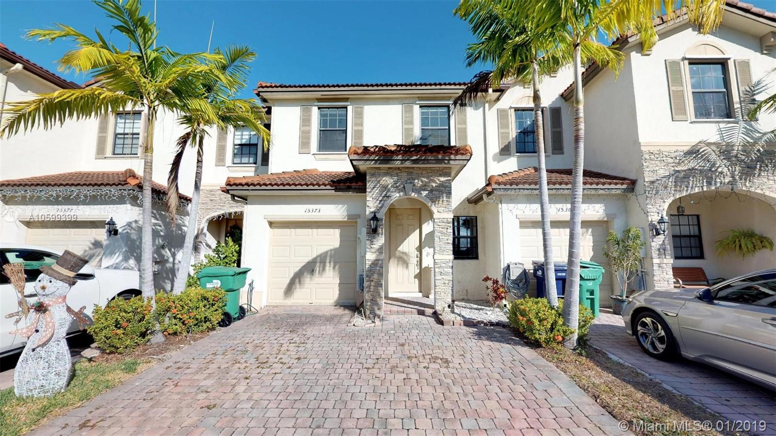 Remodeled 2 story townhouse located in the Garden Estates community in the Hammocks. Kitchen has all appliances and granite counter tops. Fully-renovated 3 bedroom and 2.5 bathroom with large closet spaces. First floor has marble tile and Second floor has brand new carpet installed. Washer and dryer are upstairs. Master bathroom has a double vanity. Fenced Private patio perfect for gatherings or lounge area. Two private parking spots are available along with guest parking. Overall a quiet community with nearby shopping centers and easy access to the turnpike. Association includes lawn, cable and amenities like the pool, gym and clubhouse. Move in ready!