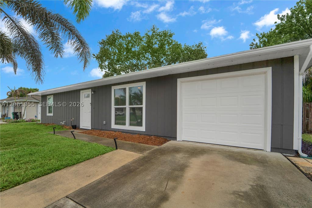 Photo of 1718 SW Mcallister Ln, Port St Lucie, FL 34953 (MLS # A12061955)