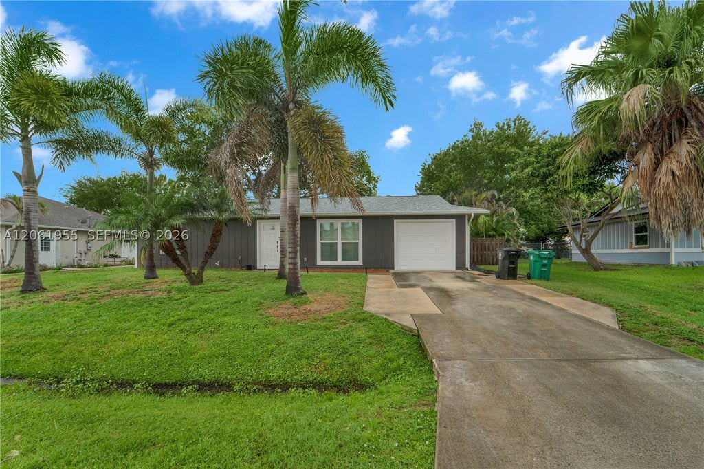 Photo of 1718 SW Mcallister Ln, Port St Lucie, FL 34953 (MLS # A12061955)