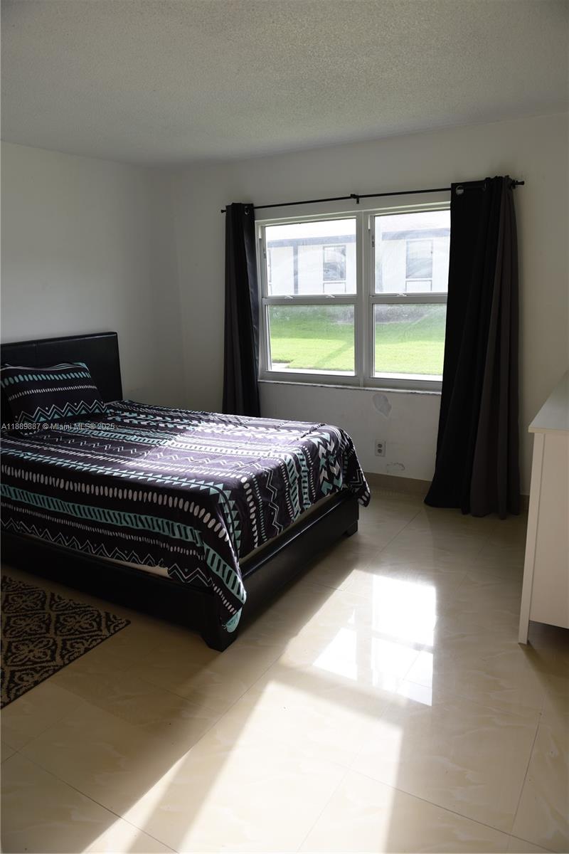 LAURELS AT MARGATE CONDO - Residential Lease