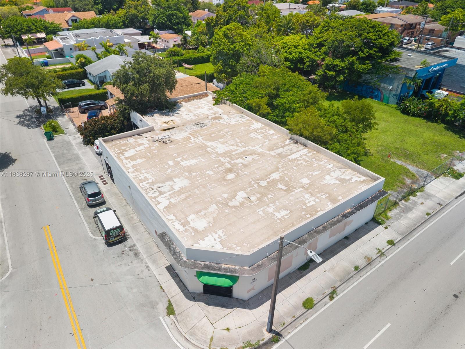 Industrial property located at 102 NW 22nd Ave, Miami, FL 33125. The T6-8-O zoning designation indicates an urban core zone (T6) with a maximum building height of 8 stories (8) and a focus on urban form and design (O). This zoning allows for a diverse mix of uses, including residential, commercial, and industrial development.