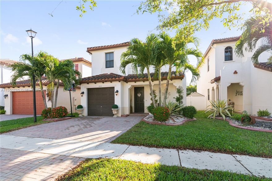 If you're looking for a luxurious and secure place to call home, look no further than the upgraded single family home in Waterview at Miramar. This gated community offers private security patrol, a pool, and guest parking. The home has 3 bedroom, 2.5 bathrooms. Open concept gourmet kitchen. With upgrades like Crown Molding, 42" cabinets, granite in kitchen/bathrooms, hi-hat lighting, storm shutters, and a wood staircase you can't go wrong! Extended back yard with new pavers and Plenty of space to relax and entertain. With plenty of amenities and features, this could be the perfect place for you to call home.  Garage converted it can be the 4th bedroom, office space or den. Very close to Hard Rock Stadium and the FL Turnpike. Don't miss out!