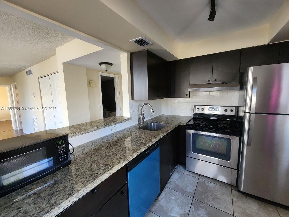 Welcome to your urban oasis in the vibrant heart of Miami Beach! This stunning one-bedroom apartment with a den offers the perfect blend of modern living and coastal charm, complete with the added convenience of assigned parking. Large 855 Sq Ft remodeled apartment, 1 Bed Plus DEN, the den can be used as a second bedroom or office. The apartment is located 3 blocks from the beach. A large balcony and a gated assigned parking make a real difference as well as the pool. Wood floors all around with an open kitchen with stainless steel appliances. One bathroom and a half and plenty of closet space. Central AC. Pets are welcome. Centrally located, minutes from South Beach and Bal Harbor Mall. A video is available.