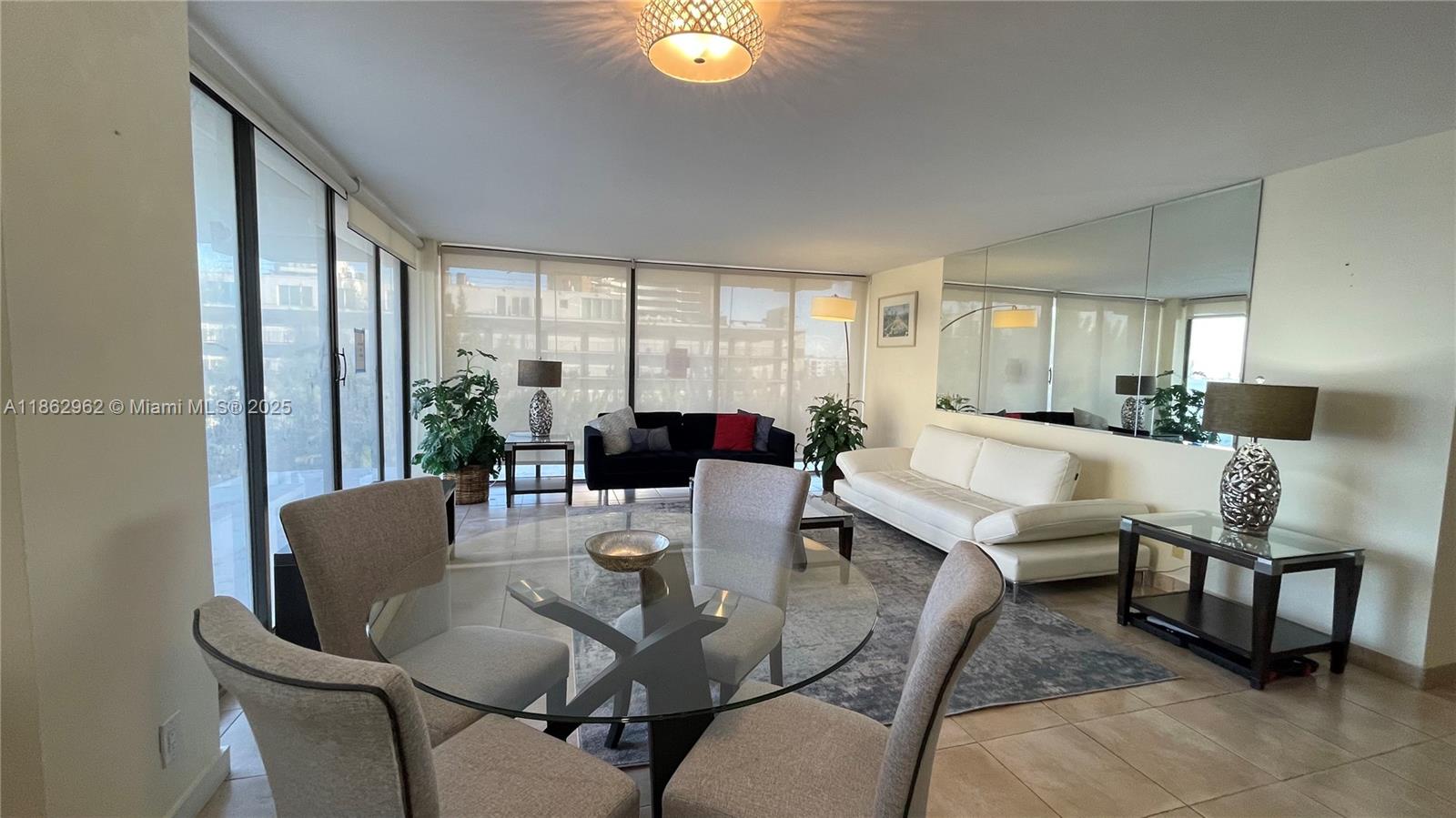 Spectacular Bayfront residence at the Palm Bay Yacht Club! This spacious and comfortable 1316 sq. ft. updated corner unit offers 2 bedrooms / 2 baths, a wraparound balcony, and stunning floor-to-ceiling glass windows that flood the space with natural light. Features include an in-unit washer & dryer and tastefully furnished rental. The Palm Bay Yacht Club is a full-service building featuring a 24-hour doorman, valet service, fitness center, gated/guarded entry, and more. Prime location in Miami’s Upper East Side, minutes from the Design District, Wynwood, Midtown, and Downtown. Walk to nearby parks, the farmers market, and a wide selection of restaurants.