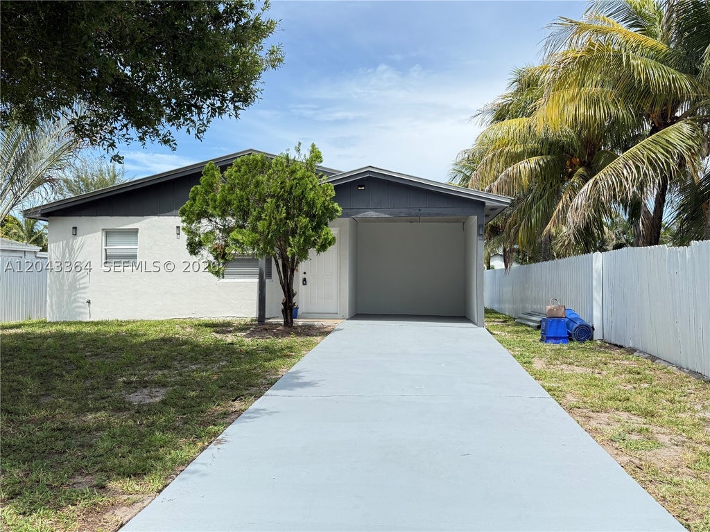 Photo of 96 Caroline Dr, West Palm Beach, FL 33415 (MLS # A12043364)