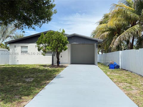 Photo of 96 Caroline Dr, West Palm Beach, FL 33415 (MLS # A12043364)