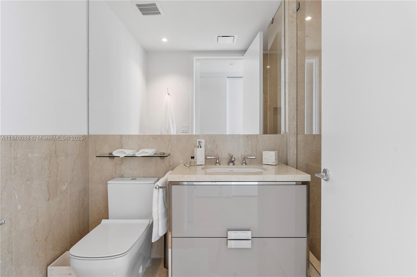 15701 COLLINS CONDO - Residential Lease