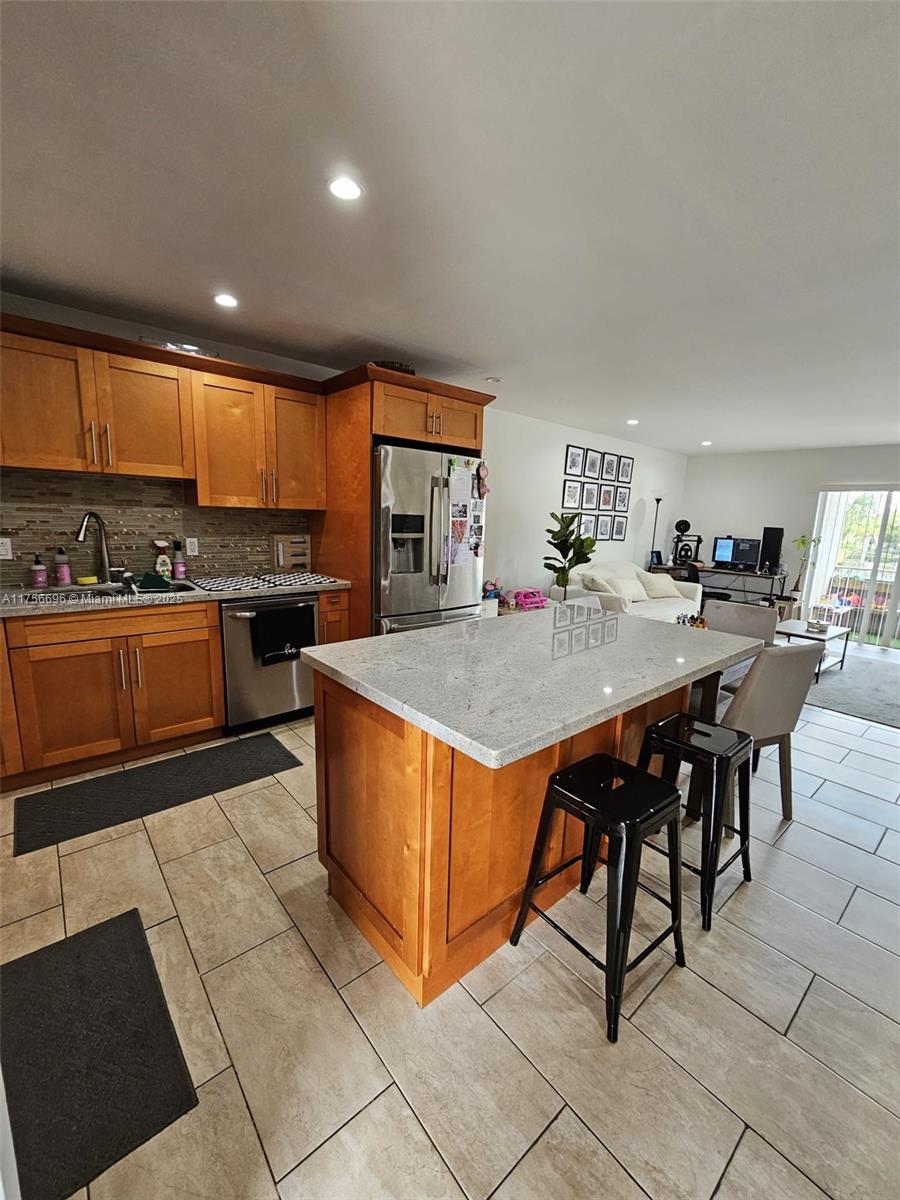 Discover this exquisite corner unit condo in vibrant Kendall! Perfectly situated just minutes from Dadeland Mall, Downtown Dadeland, U.S.1, Palmetto Expressway, and Hwy 878 to the Turnpike, you're at the center of it all. Indulge in fine dining and upscale shopping, with a supermarket nearby for everyday needs. Families will love the A+ rated schools. This spacious 2-bedroom, 1-bath retreat offers 900 sqft of modern comfort, complete with 2 dedicated parking spaces. Unwind in style with exceptional community amenities, including a sparkling pool, soothing jacuzzi, elegant clubhouse, and well-maintained tennis courts. As per management company, this community has the reserves required to qualify for a 5% down payment conventional loan. Buyers lender must verify.