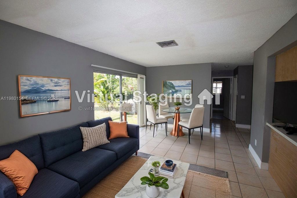 Photo of 825 SW 10th St #B, Hallandale Beach, FL 33009 (MLS # A11980154)