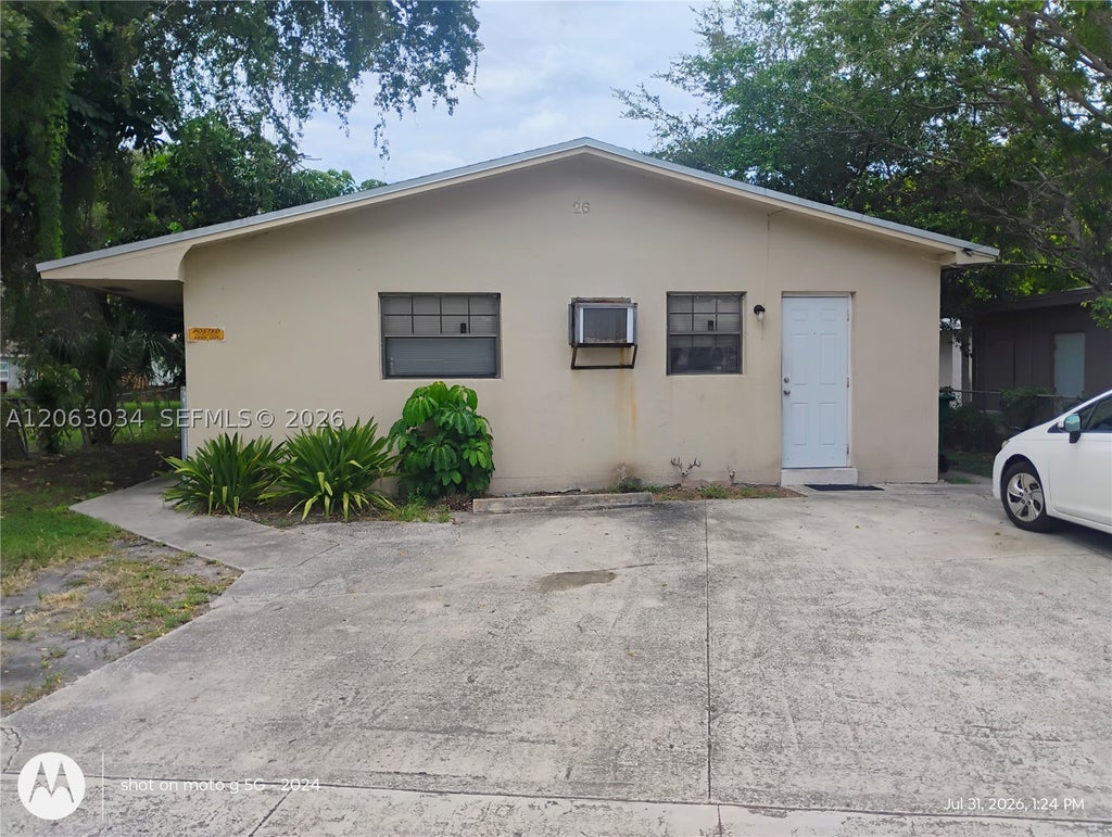 Photo of 26 SW 6th Ave #1-2, Dania Beach, FL 33004 (MLS # A12063034)