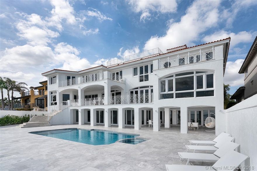 Coconut Grove's "El Mirador" Estate, privately situated on the open bay. Only one of 5 rarely available waterfront properties in the small & exclusive community of The Anchorage. This completely custom-built home embodies clean coastal style and airy sophistication complete with your own private harbor & three boat slips. Primary living and entertaining space is located on the second level which offers unmatched panoramic views of Biscayne Bay throughout. Spectacular water views from every room - 7 Beds & 8. 5 Baths all en suite. A waterfront home to call home.