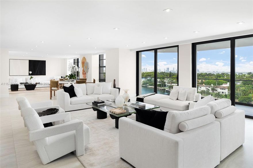 This stunning 5,695 SF combined unit has been completely renovated from the wall studs out- no expense spared. This 4BR/3+2BA residence features magnificent waterfront views overlooking Indian Creek and Downtown Miami. An inviting foyer leads to a spacious living room and library/den with floor-to-ceiling windows that open to an expansive wrapping terrace. The dining area is adjacent to an enormous gourmet chef’s kitchen with designer finishes, top-tier appliances, and eat-in seating. The private family room offers a perfect space to unwind, while the sumptuous principal suite includes a walk-in closet, private terrace with city and ocean views, and a spa-inspired bathroom with lux custom closets. 3 additional bedrooms offer ocean views, completing this remarkable residence.