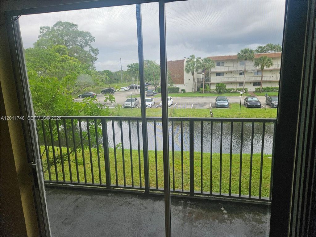 Photo of 7561 NW 16th St #2210, Plantation, FL 33313 (MLS # A12011748)