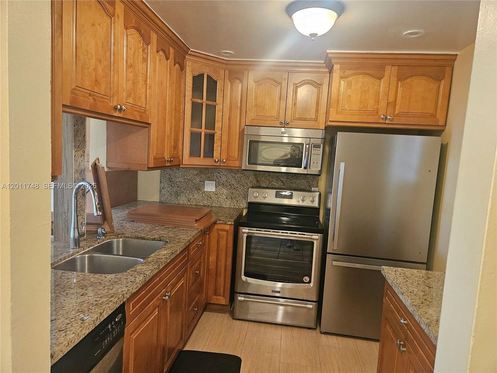 Photo of 7561 NW 16th St #2210, Plantation, FL 33313 (MLS # A12011748)