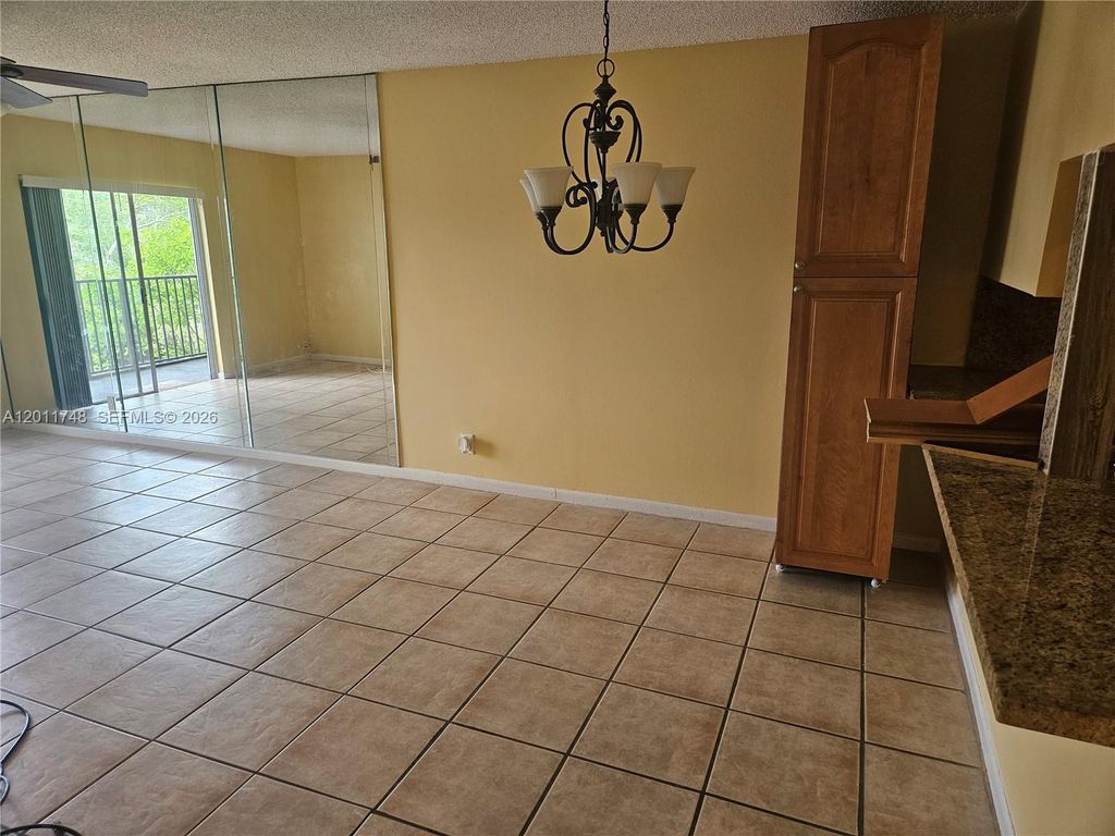 Photo of 7561 NW 16th St #2210, Plantation, FL 33313 (MLS # A12011748)