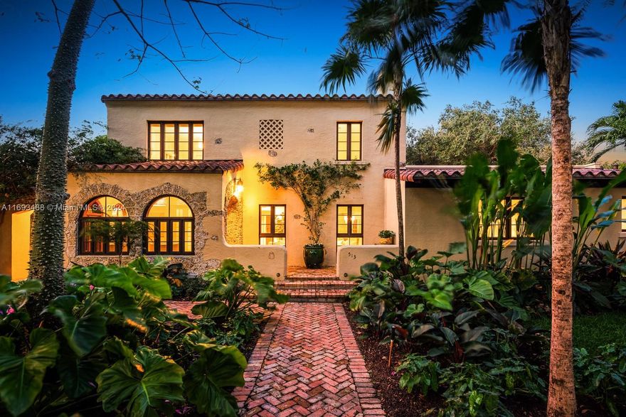 1920's classic 2 story turn-key Old Spanish" style 5/3 + 1/1 with 3709 sq ' of living area on a 13,000 sq ' lot in a highly desirable, historic Coral Gables neighborhood just steps to the City center with its wealth of world class restaurants, art galleries and smart shops. Beautifully updated and expanded in 2008 by an owner keen on preservation. The charm and character of the original 1928 structure has remained and continued in the look of the 2008 addition. Oak floors, wood burning fireplace, impact doors and windows, foyer, formal living room, large family room, dining room, gourmet kitchen with gas range, 2 offices, large, covered terrace facing huge pool. Primary bedroom/bath + another bedroom upstairs. 3 other bedrooms and 2 baths downstairs. 1/1 studio guest house. Carport