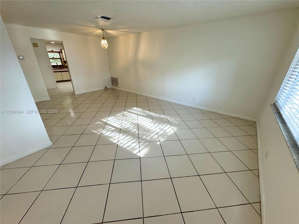 Photo of 61 SW 34th Ave, Deerfield Beach, FL 33442 (MLS # A12024544)