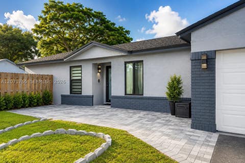 Photo of 8601 NW 192nd Ter, Hialeah, FL 33015 (MLS # A12071765)