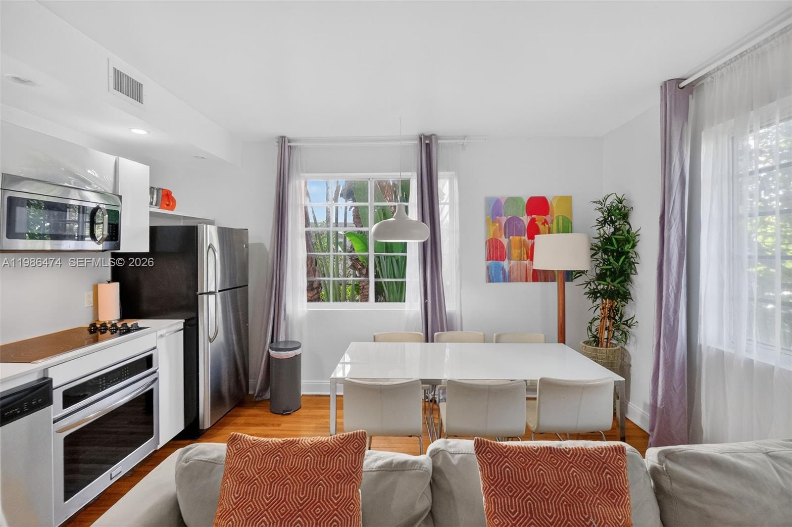 ESSENZA AT 1410 EUCLID CO - Residential Lease