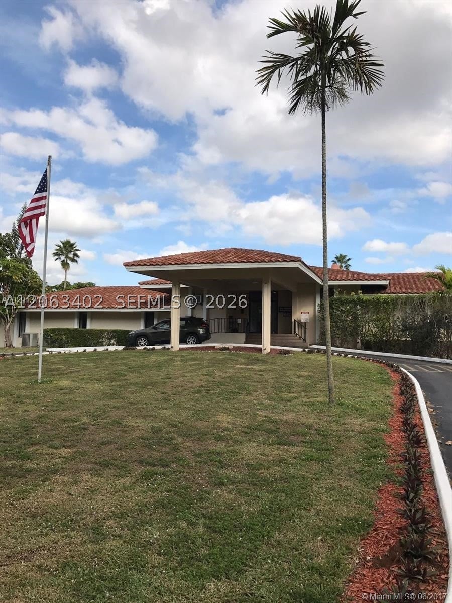 Photo of 4174 Inverrary Dr #411, Lauderhill, FL 33319 (MLS # A12063402)