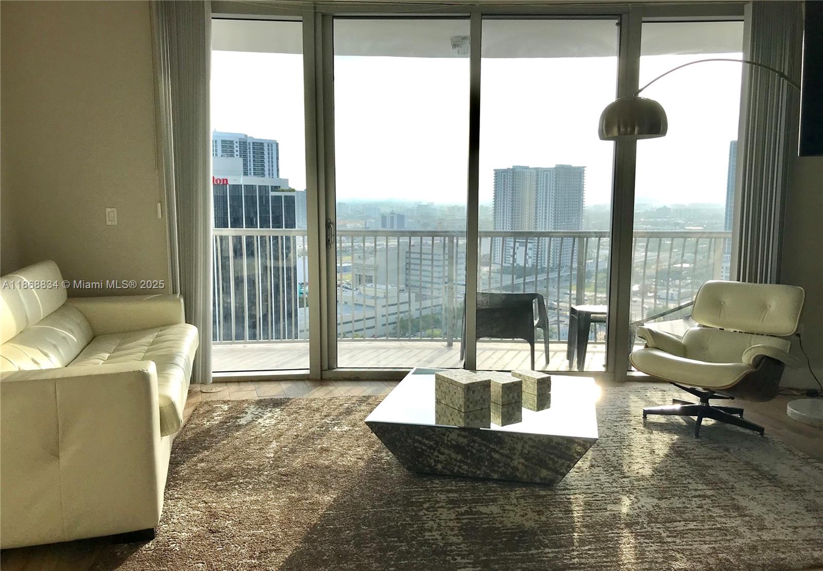 Spacious 2BD/2BA unit in Opera Tower with stunning bay and city views from the 30th floor! This bright and modern condo features floor-to-ceiling windows, an open kitchen with stainless steel appliances, and a spacious wraparound balcony. Located in the heart of Edgewater, just steps from dining, parks, and entertainment. Please note: The pool is currently closed for renovations, with reopening expected in November per the building association.
Furnished as shown, but removal of some or all furniture can be considered depending on the terms.