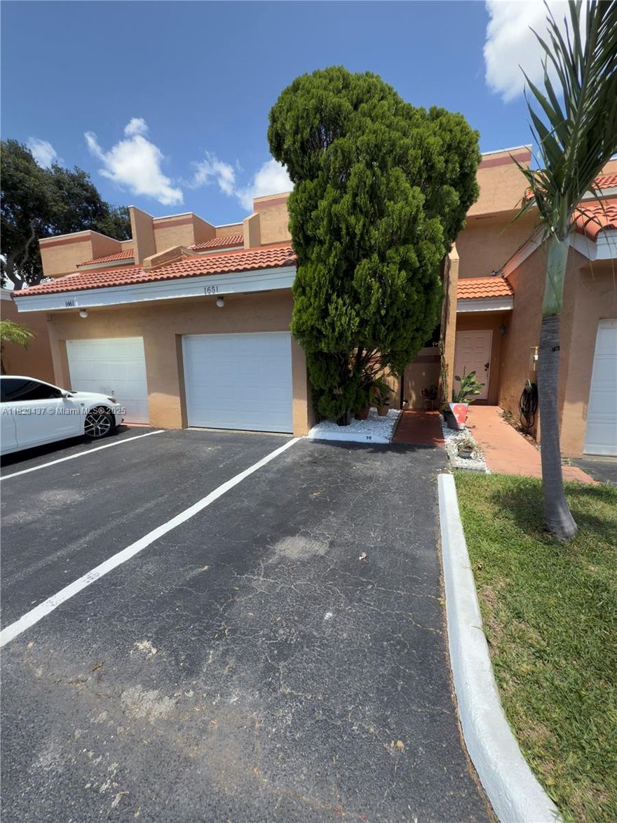 RARE FIND! Spacious 4 bedroom and 3 FULL bathroom townhouse with 1 car garage and 2 assigned parking spaces located in front of the home. Located in a quiet well-maintained community, this home offers comfort, functionality and convenience in one of Pembroke Pines most desirable areas near ALL major highways. Roof was re-done in 2023, Community offers , pool, handball court and common areas. HOA has reserves and welcomes FHA buyers. This home is ideal for families, first time-buyers or investors seeking value and location.