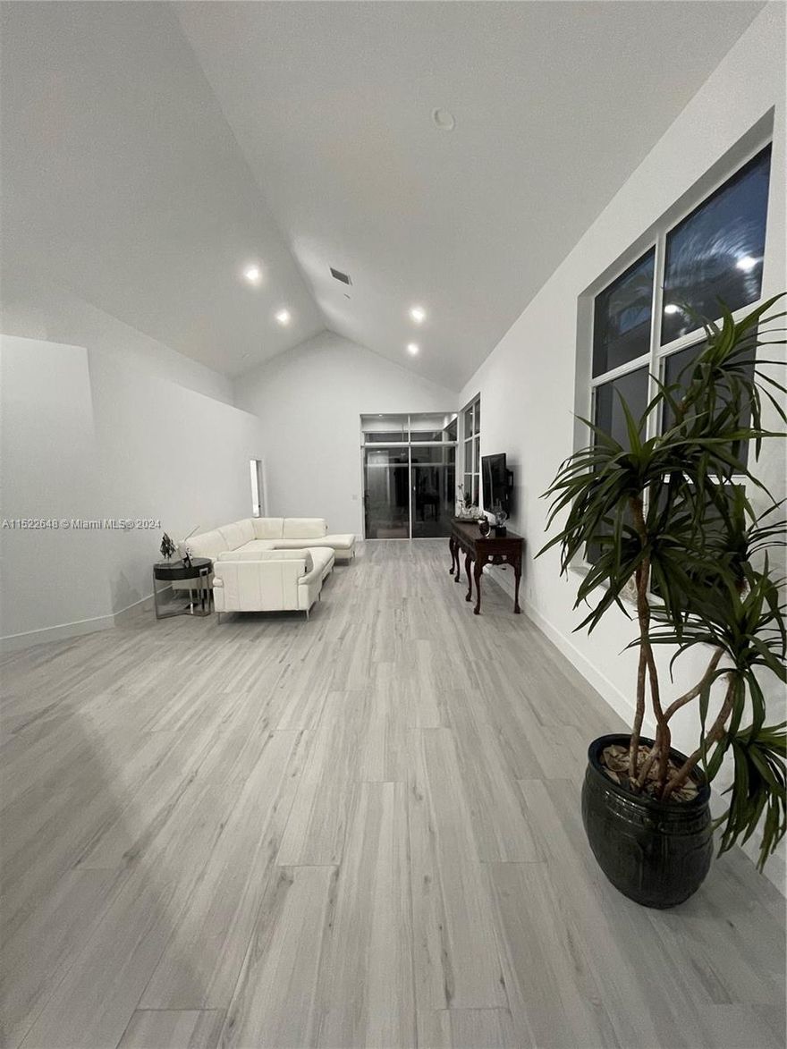 Recently renovated residence. Features vaulted ceilings, abundant natural sunlight, and a split bedroom floor plan.  Eat in kitchen with bar, quartz countertops and backsplash, with stainless steel appliances. Bedrooms have custom walk-in closets. Bathrooms have frameless glass shower doors and floating vanities. Master bathroom has skylights. Newer a/c from 2023. Roof is recent and in great shape.