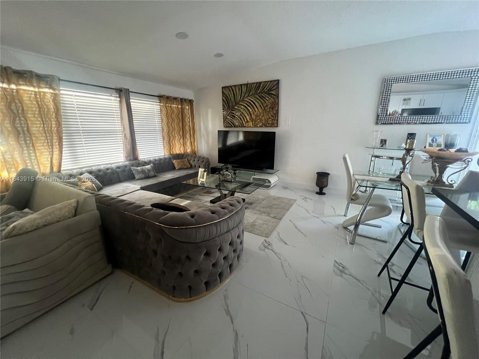 "Don't miss out on this exceptional property! This beautifully updated home boasts brand-new floors, a sleek, modern kitchen, and a fully renovated bathroom. With impact windows throughout, you'll enjoy enhanced safety and energy efficiency. Plus, a fully functional efficiency generates $1,500/month in rental income, making it the perfect opportunity for investors or anyone seeking additional income. The seller is also offering $10,000 towards the buyer's closing costs, making this an even more attractive deal. With all the upgrades already done, this move-in-ready home is an incredible value. Act fast—this one won’t last long!"