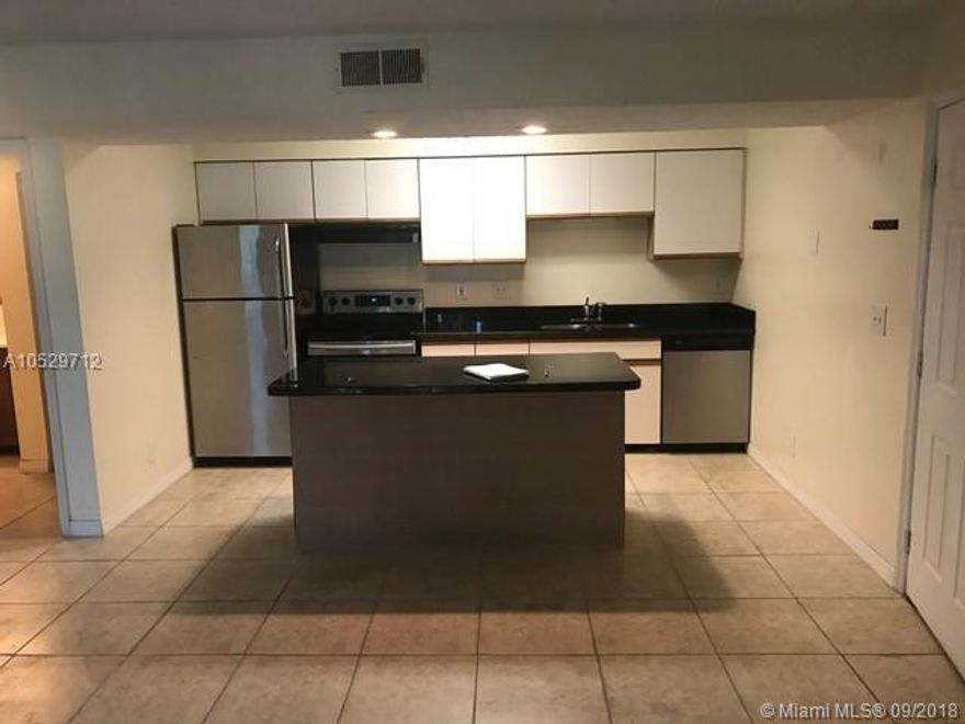 wow spectacular unit with tile floor, large balcony, washer and dryer inside the unit. open kitchen with an island and granite counter top. easy to show on lbx. go to showing assist for lbx info