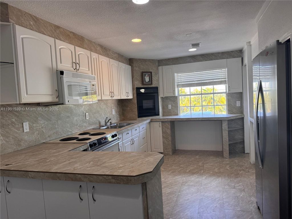 Photo of 969 Plantation Rd, Key Largo, FL 33037 (MLS # A11901539)