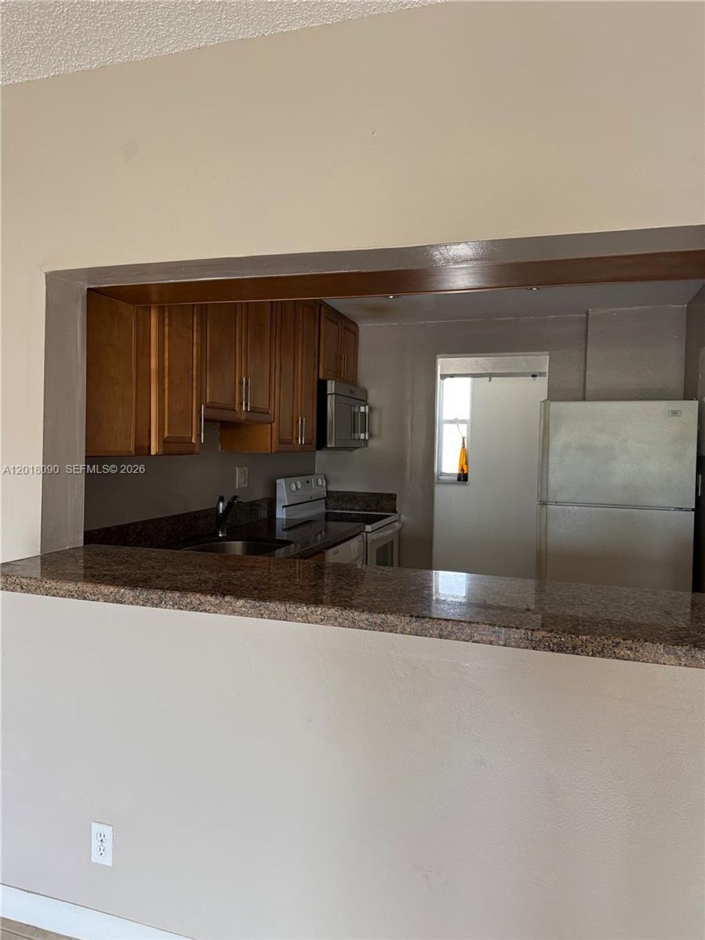 Photo of 8020 N Colony Cir N #209, Tamarac, FL 33321 (MLS # A12018090)