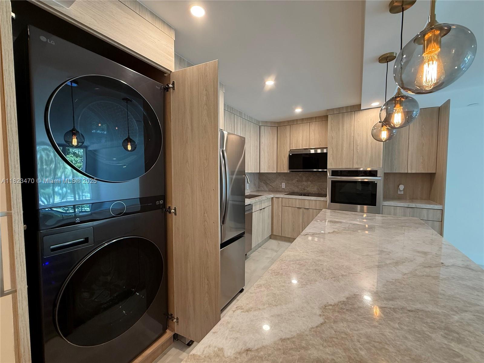 Look no further—this is the best-designed condo in the building. Fully remodeled with meticulous attention to detail by its owners, both designers and contractors. Just steps from the beach, this bright, fresh unit is filled with natural light and coastal energy. Features include onyx porcelain floors and bathroom walls, custom closets, in-unit washer/dryer, quartzite island and countertops, built-in coffee station, and a refined European aesthetic. Every finish was chosen for elegance, function, and sophistication. Minutes from Aventura Mall, top Sunny Isles restaurants, and the area’s best schools. A transformation built with passion.
