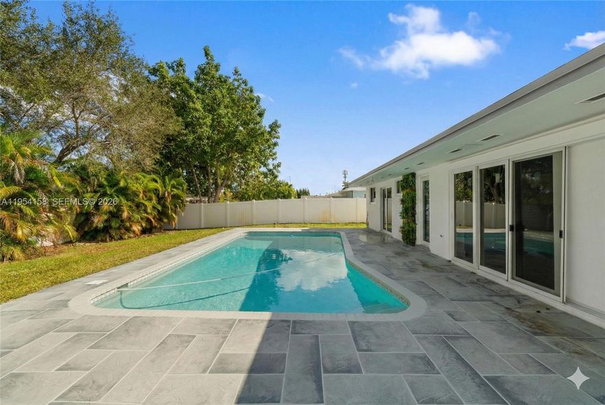 Beautifully remodeled pool home in the heart of Plantation Park, one of Broward's most sought-after neighborhoods. This move-in ready 3 bed / 2 bath residence sits on an oversized 10,000+ sq ft lot with no HOA and offers the perfect blend of modern upgrades and outdoor living. Step inside to find a bright, open layout with tile flooring throughout and a fully updated kitchen featuring new cabinetry, quartz countertops, and stainless steel appliances. Both bathrooms have been completely renovated with contemporary finishes. Major upgrades include a new roof, full eco impact windows and doors, and AC in great condition, giving buyers true peace of mind and significant insurance savings. Outside, enjoy a sparkling pool with a newly resurfaced deck, lush landscaping on an oversized lot, covered carport, and a spacious backyard perfect for entertaining. Zoned for the highly rated Plantation Park Elementary (9+). Minutes from top dining, shopping, major highways, and everything Plantation has to offer. This is the turnkey home buyers have been waiting for — fully upgraded, move-in ready, and priced to reflect real value. Property Condition Disclosure and Lead Paint Disclosure available
