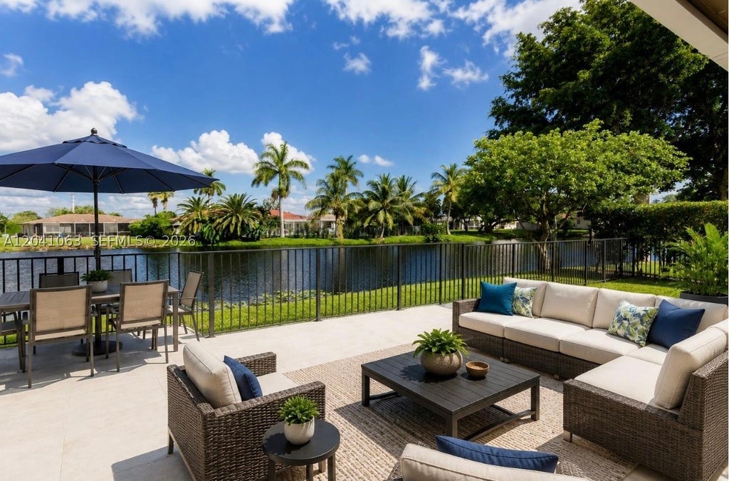 Photo of 16641 Royal Poinciana Dr, Weston, FL 33326 (MLS # A12041063)