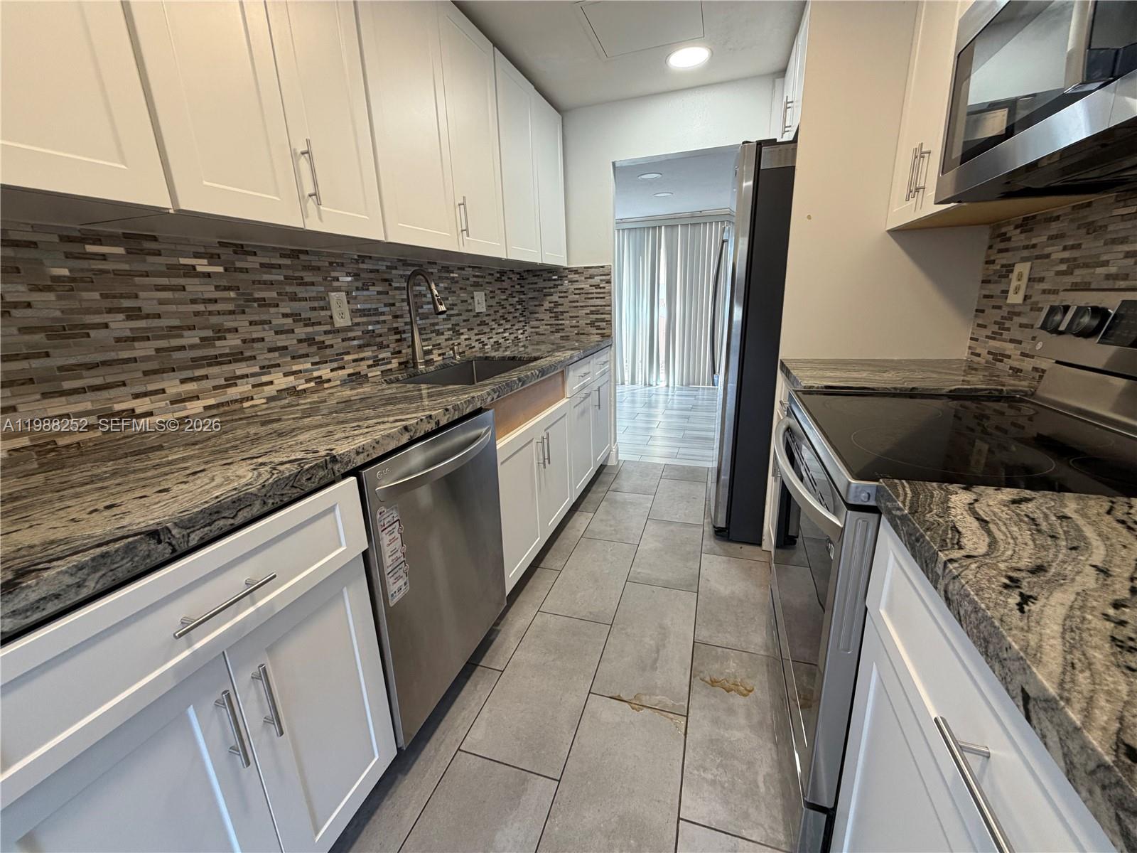 TOWNHOUSES AT JACARANDA C - Residential