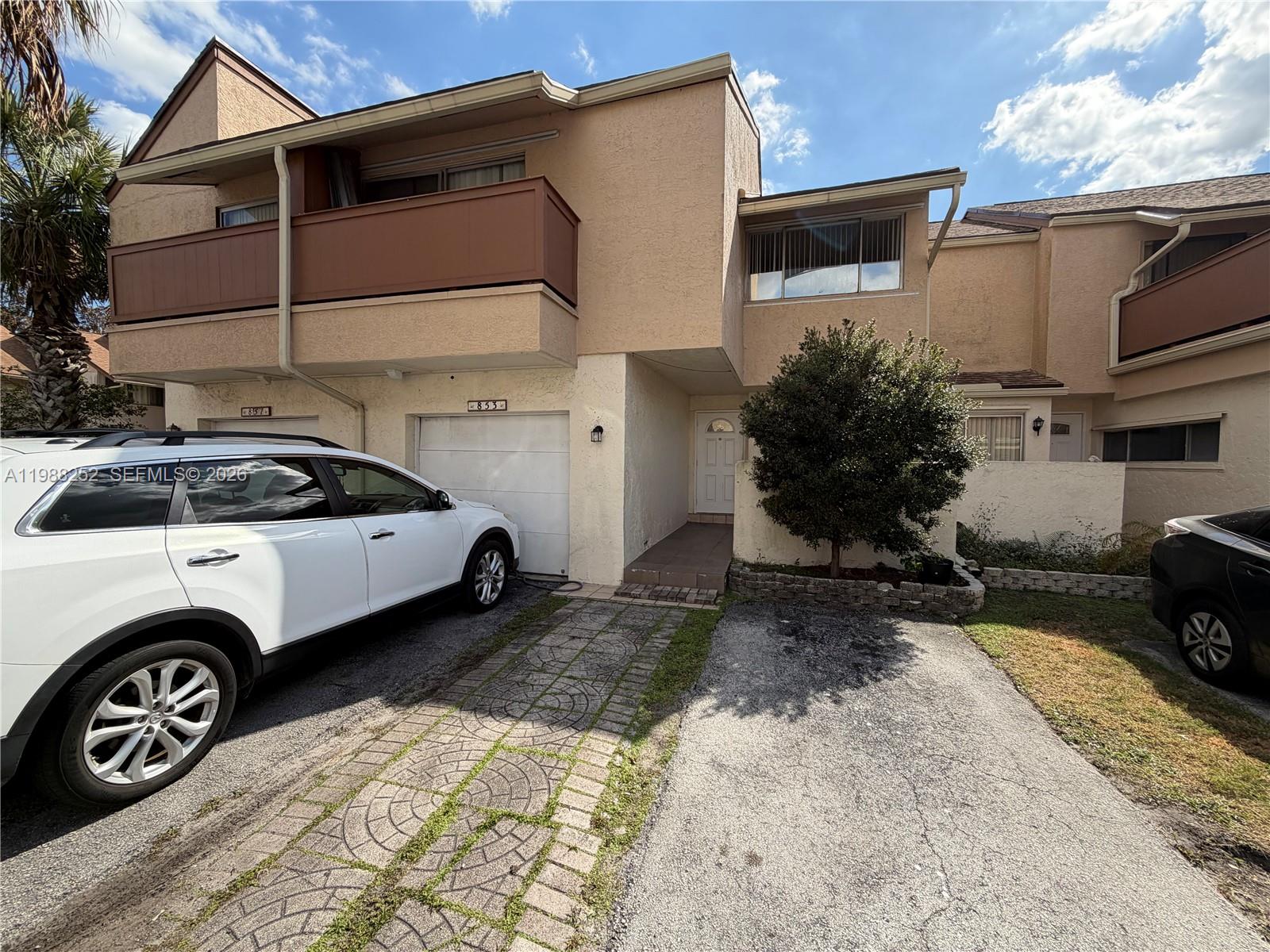 TOWNHOUSES AT JACARANDA C - Residential