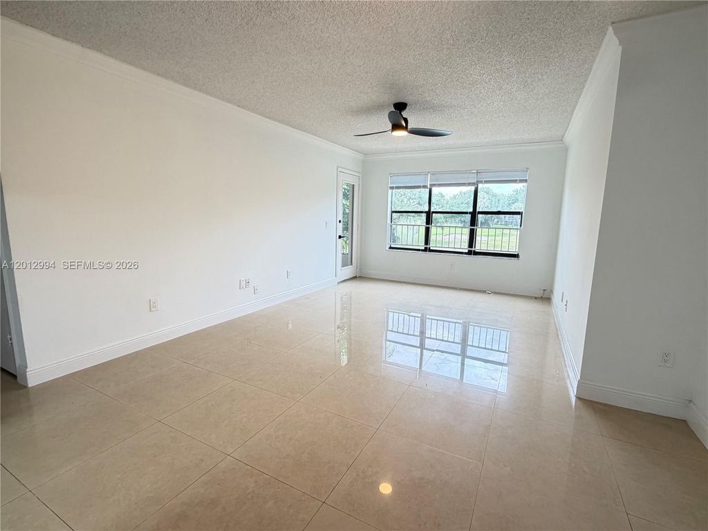 Photo of 4281 W Mcnab Rd #25, Pompano Beach, FL 33069 (MLS # A12012994)