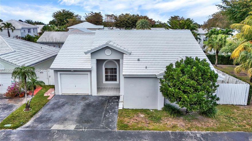 Come and fall in love with this 3 bedroom / 2 bathroom home with a 1-car garage and a well laid out floor plan in a gorgeous community. Britannia is an elegant, safe, and well maintained neighborhood with a British Colonial flare. With the white flat tile roofs and pastel colored homes, you will feel like you just arrived in Bermuda! This home is very well maintained. New roof was installed in 2020 and was painted right afterwards, and the air conditioner is also pretty new. The kitchen features elegant and practical granite countertops and quality cabinets. The 2nd bathroom was tastefully updated. The back and side yards are concrete which provides for clean and low maintenance living. If you compare the homes in Britannia with those in the surrounding area, you will see that you get a lot of house for the money! The HOA is well managed to provide a strict yet friendly and welcoming Security Staff at the gatehouse and a roving patrol. The community pool, tennis courts, and children's playground are well maintained. You will love taking walks or runs, walking your dog, and getting to know your neighbors in this friendly and stable community. Make sure to make an appointment soon to see if this home might be the right one for you and your family.