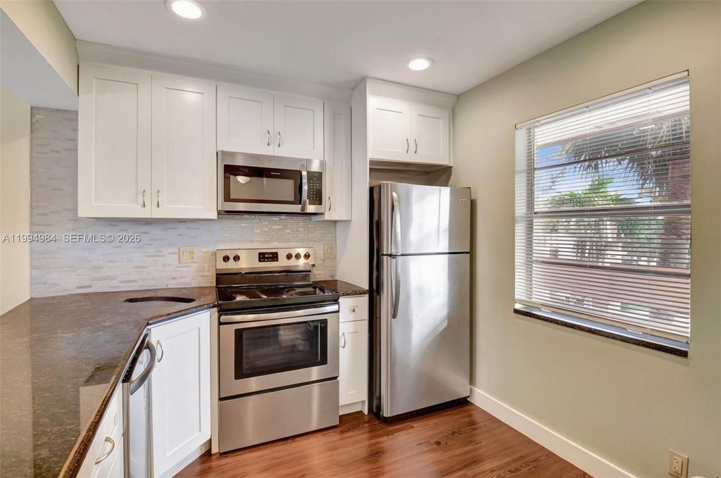 Photo of 14721 Bonaire Blvd #308, Delray Beach, FL 33446 (MLS # A11994984)