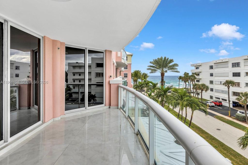 Photo of 2051 SE 3rd St #406, Deerfield Beach, FL 33441 (MLS # A11968104)